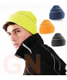 Gorro de punto acrílico  con borde vuelto color amarillo flúor