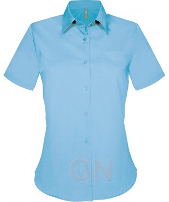 Camisa de manga corta con bolsillo para mujer. Color celeste