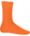 Calcetines finos elásticos con efecto brillo color naranja
