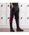Pantalón deportivo con cintura elástica y bolsillos  para adulto