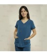 Casaca sanitaria color Azul caribe, antibacteriana con espalda transpirable para mujer