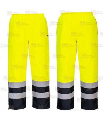 Pantalón bicolor y acolchado de alta visibilidad para lluvia color amarillo flúor y marino