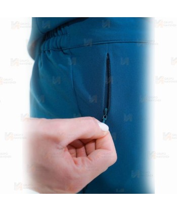 Pantalón sanitario tobillero de mujer con tejido elástico color turquesa oscuro