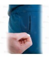 Pantalón sanitario tobillero de mujer con tejido elástico color turquesa oscuro