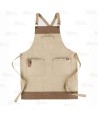 Delantal con peto en tejido canvas combinado con piel vegana color verde beige/marrón